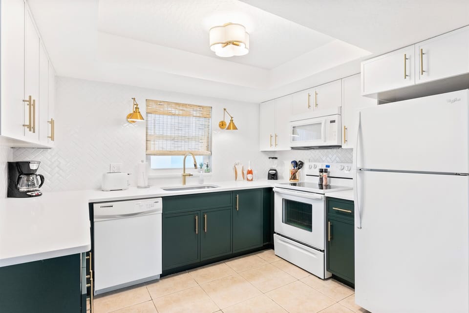 Brand new coastal inspired kitchen with quartz counters