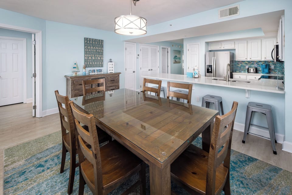 Dinner for 6 + - The dining table seats 6 guests and more seating is available at the breakfast bar