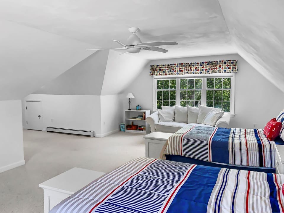 The bonus sleeping room accessed via bedroom #3, is over the garage. This spacious area has 2 Double beds