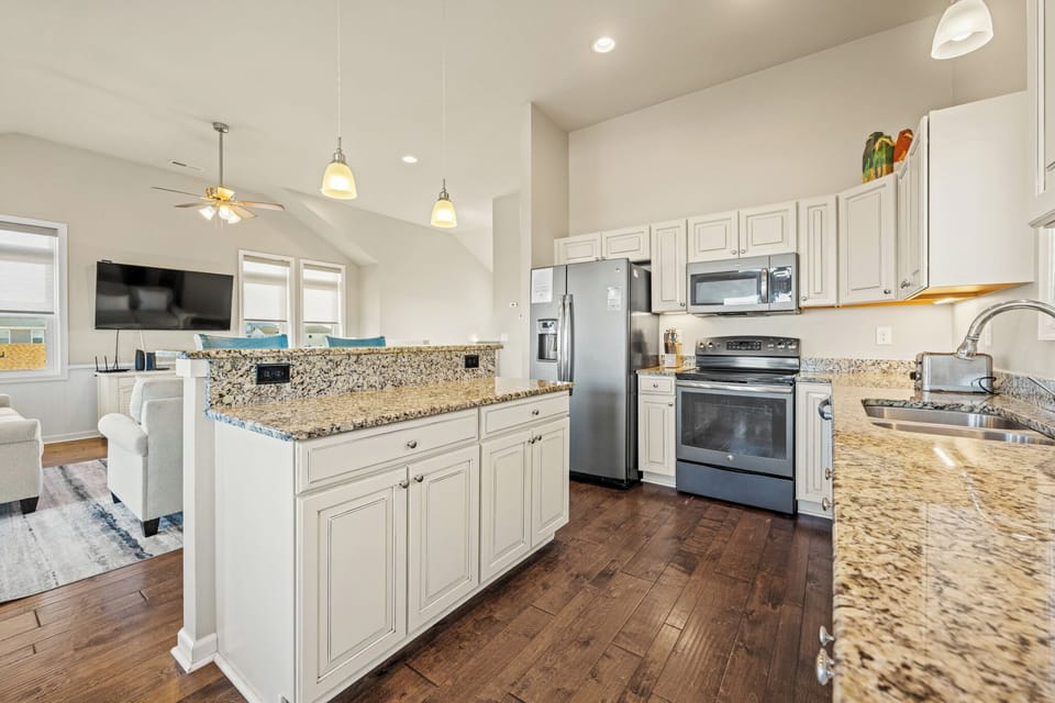 Large Kitchen with Bar Seating on the Third Level