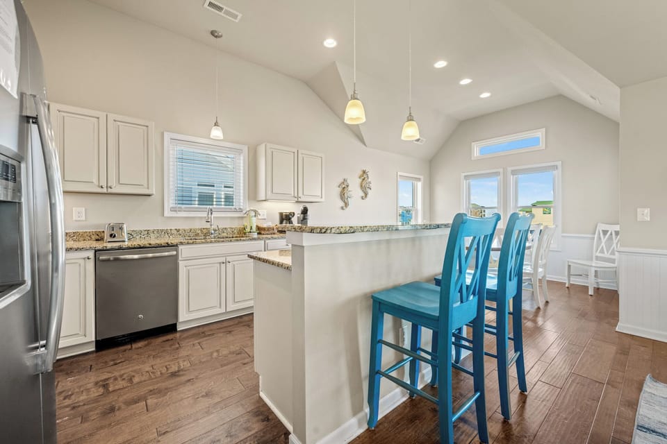 Large Kitchen with Bar Seating on the Third Level