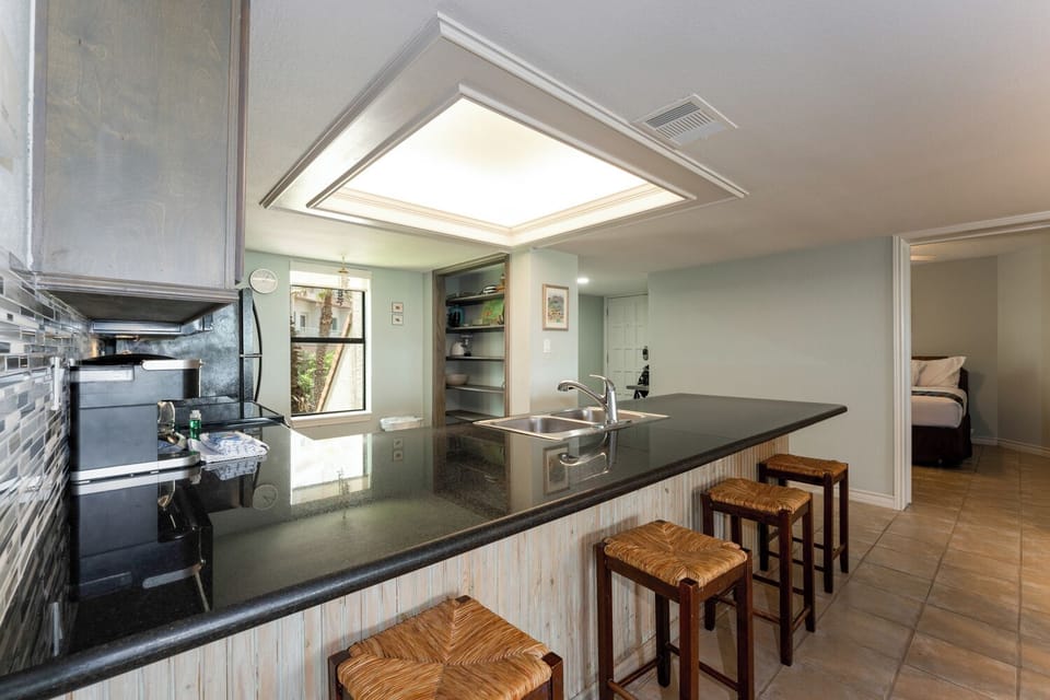 Our beautiful kitchen has a spacious bar perfect for buffet dining, entertaining the kids, or laying out snacks. However you entertain, our kitchen and breakfast bar hit the mark! Our South Padre Island condo rental is calling your name.