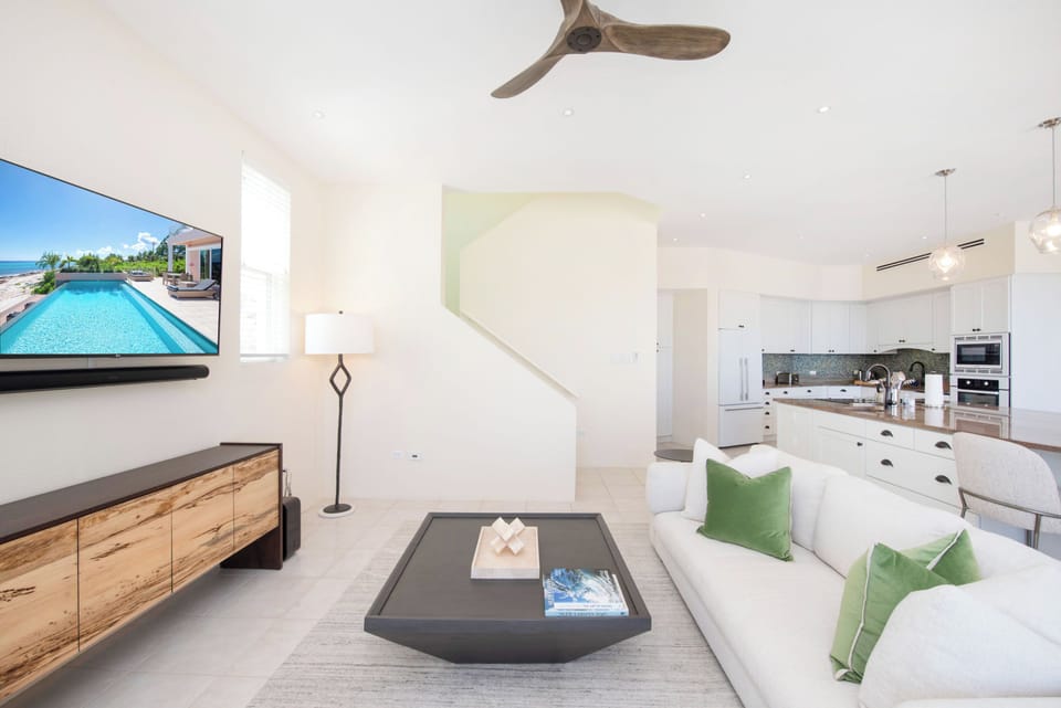 Stairs leading to the 2 upper level bedrooms. 