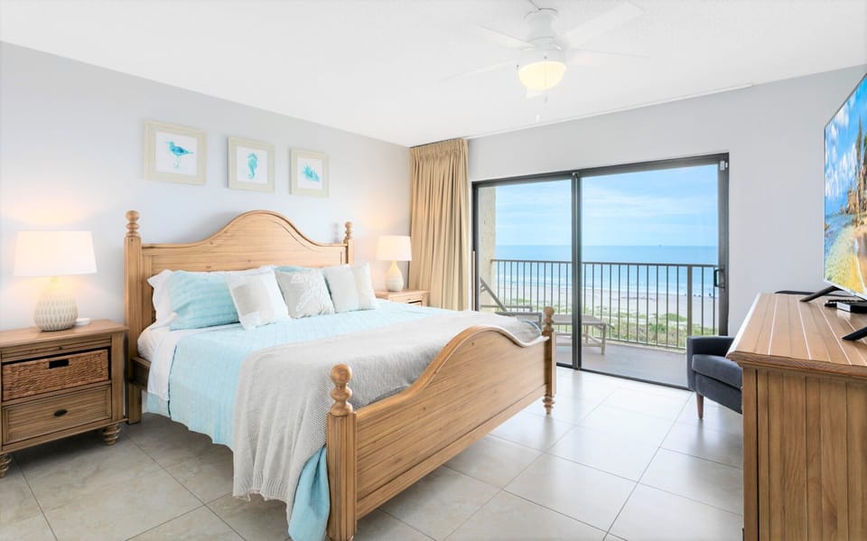 Master bedroom with ocean views and cozy plush king bed