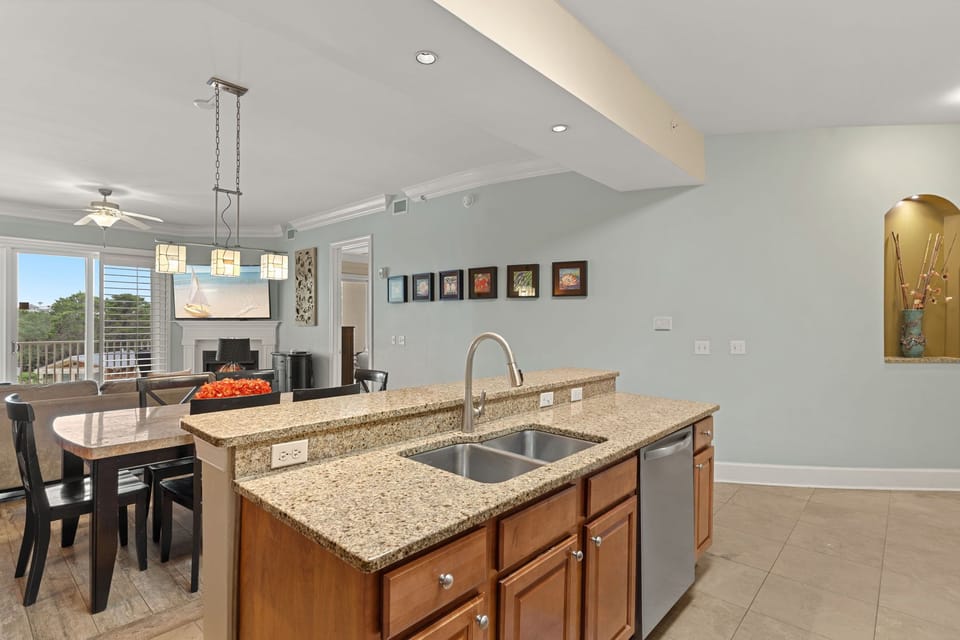 Views from kitchen over looking the dining a living spaces.