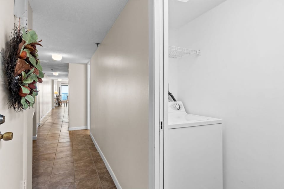 Laundry Area located in the hallway - Full size washer and dryer for your convenience.