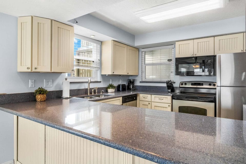 A fully equipped kitchen with modern appliances and plenty of counter space