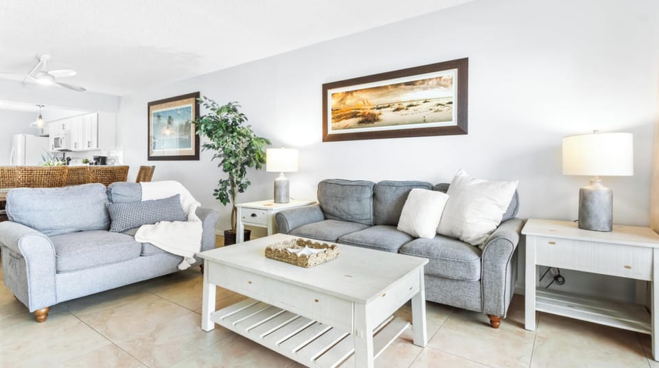 Bright & new open-concept living room with 50" flatscreen TV