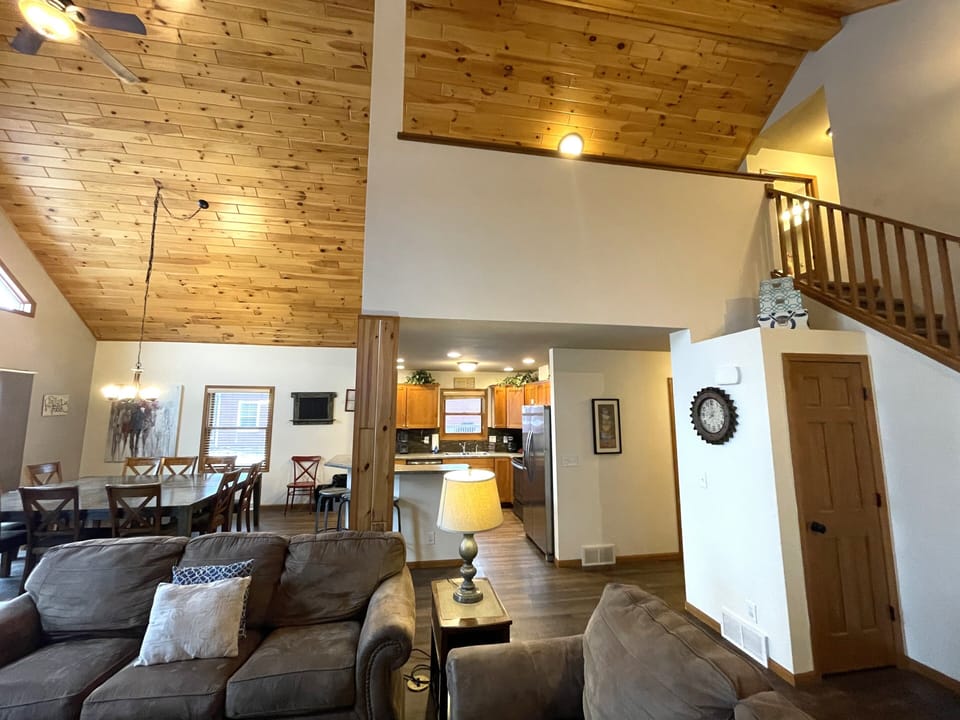 Living Room with Cozy Seating, Queen Sofa Sleeper, TV & Fireplace
