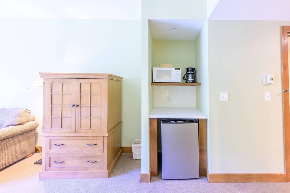 The primary suite has a sitting room, workspace and coffee station complete with a microwave and mini fridge.