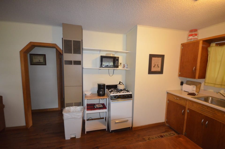 Kitchen - Full kitchen, Cookware, Dishes & utensils, Coffee maker, Microwave, Oven, Pantry items, Refrigerator, Stove, Toaster, Dining table.