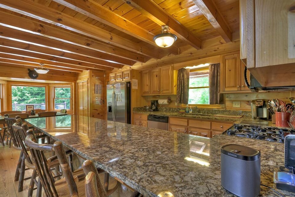 Upscale kitchen at this luxury pet-friendly cabin rental in Ellijay  