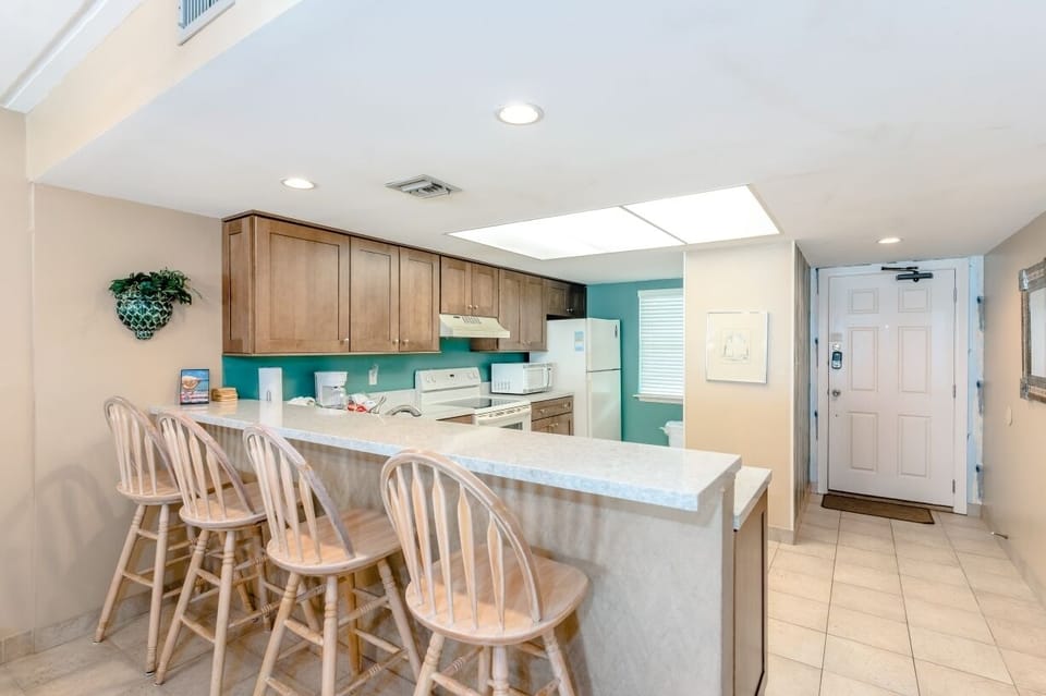 The open concept of our living and dining areas will keep you and your family connected while you enjoy our vacation home.