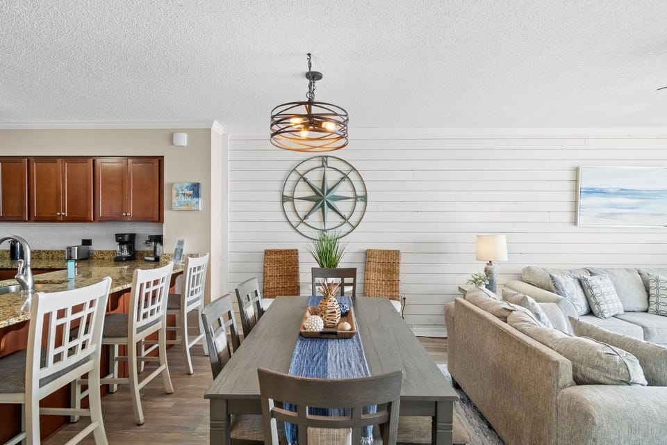 Dining Area - Dining Area: Gather around for delicious meals and laughter in this stylish, spacious setup!