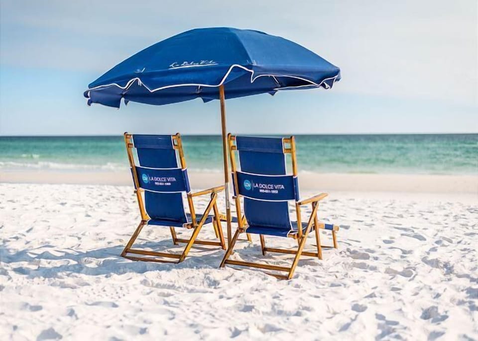 Two Chairs And An Umbrella Are Set Up Daily for You During March 1 - October 31.   ****SEASONAL BEACH SECURITY PROVIDED AT THE QUIET SURF COMPLEX to ensure your beach space!***