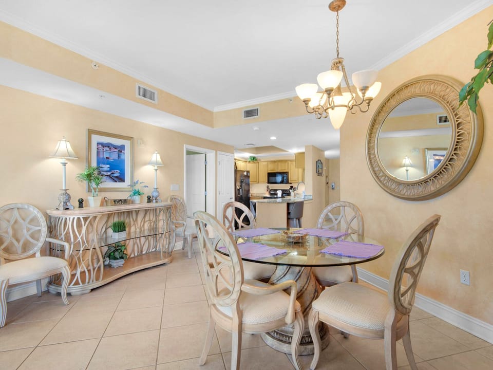 The dining area flows into the kitchen, creating the perfect space for memorable meals together