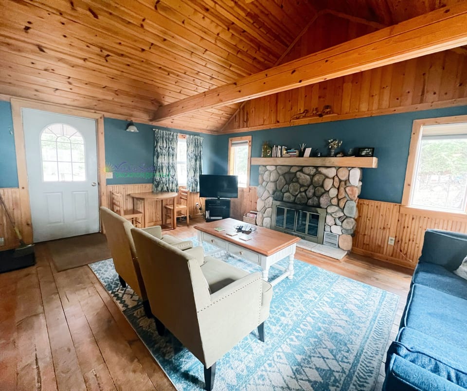 Front door into living room. - Front door into living room.