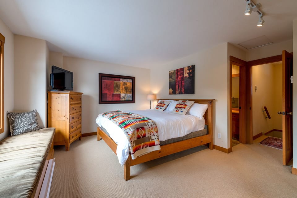 Upper Level -  Primary Bedroom With King Bed & Ensuite