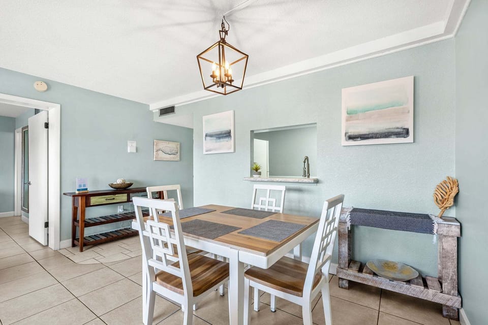 Charming dining area with coastal decor, perfect for family meals.