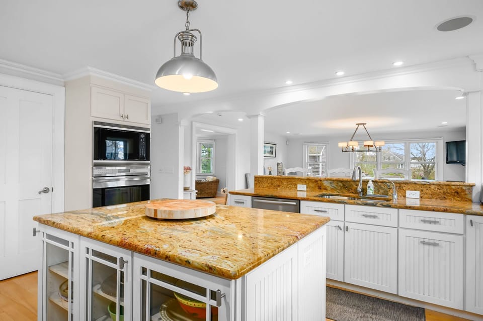 View to the dining area from the spacious and well appointed kitchen - 201 Main Street Chatham Cape Cod - Sandpiper - NEVR