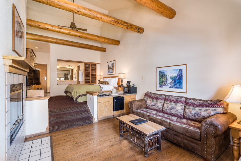 Deluxe Suite, 1 King Bed with Sofa bed, Jetted Tub, Lake View | 1 bedroom, desk, blackout drapes, iron/ironing board