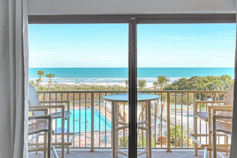 Private balcony with breathtaking ocean views, ideal for enjoying morning coffee