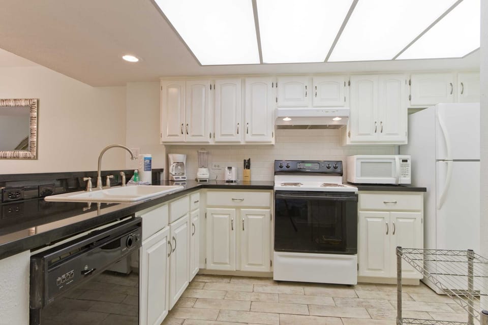 Our fully-equipped kitchen is ready for great meals. Pick up fresh groceries at Blue Marlin, our charming local grocery.