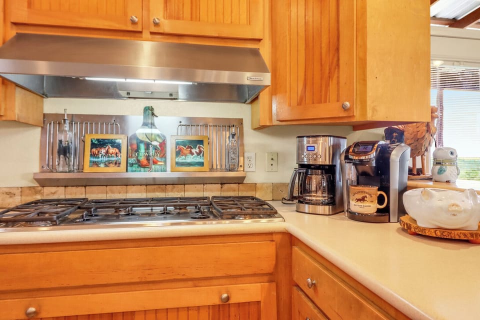 The gas cooktop makes it easy to prepare meals during your stay with a coffee maker ready when you need it.