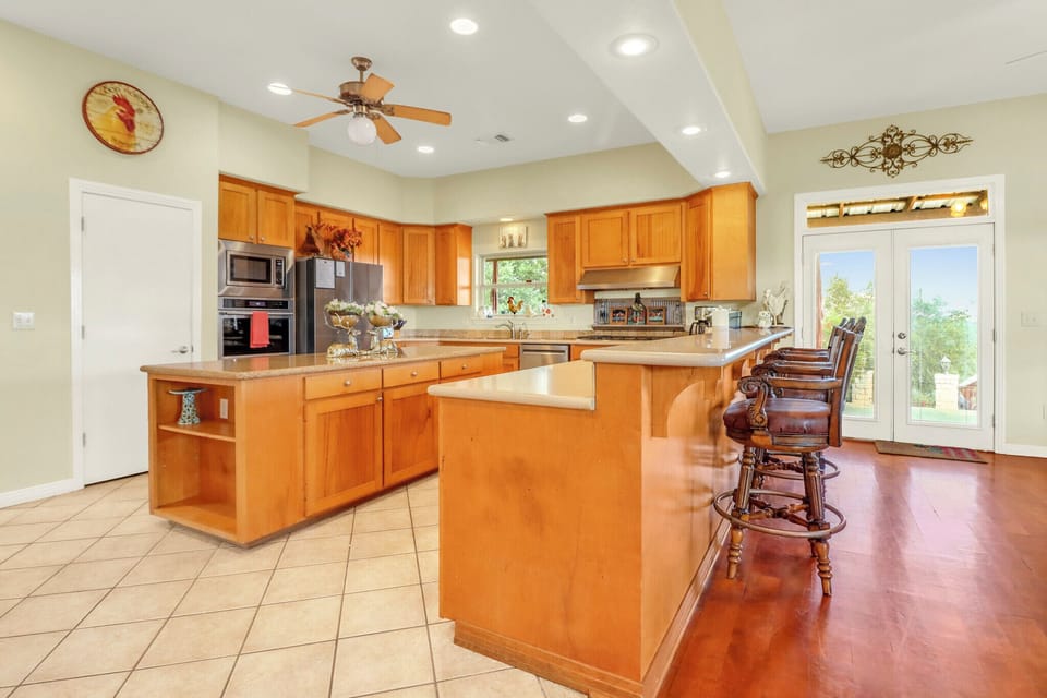 Gather around this spacious kitchen island with company