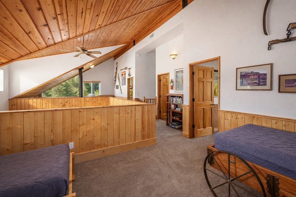 Upper Level Open Loft Space with 2 twin beds and 1 double bed