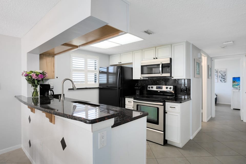 Whip up delicious meals in this sunny, modern kitchen—perfect for laughter-filled dinners and cozy nights in!