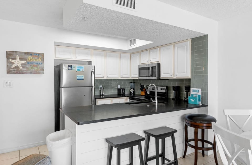 Kitchen - With additional seating at the kitchen island.