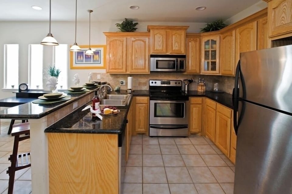Our kitchen offers full-size appliances for your convenience. Nothing is more rejuvenating than a beach vacation or a homecooked meal - you'll get both here! 