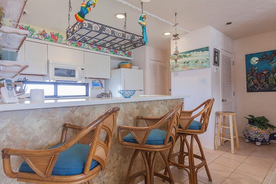 Our brunch bar looks into the kitchen where you'll love catching up with your travel companions over coffee.