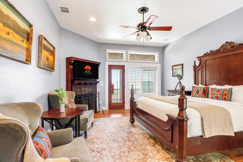 The primary suite offers a serene escape and stunning Hill Country views!