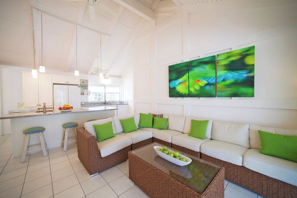 The kitchen flows into the living room offering ocean views for both.