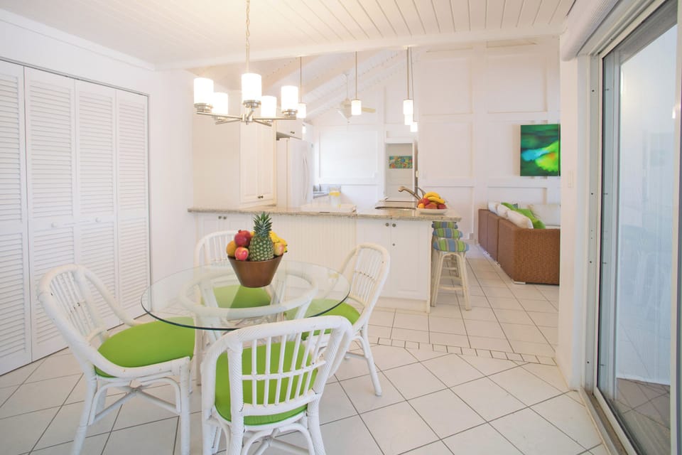 Dining table off the kitchen with seating for 4.