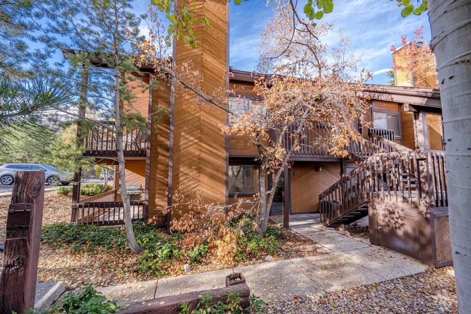 This Classic Park City condo is nestled among the pine trees and aspens