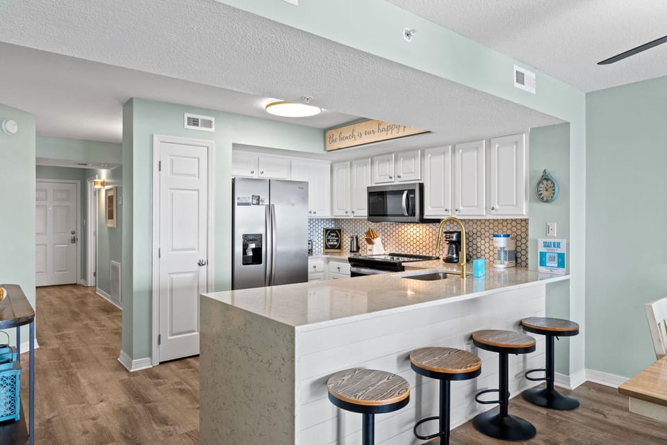 Kitchen Island - There is additional seating at the kitchen island.