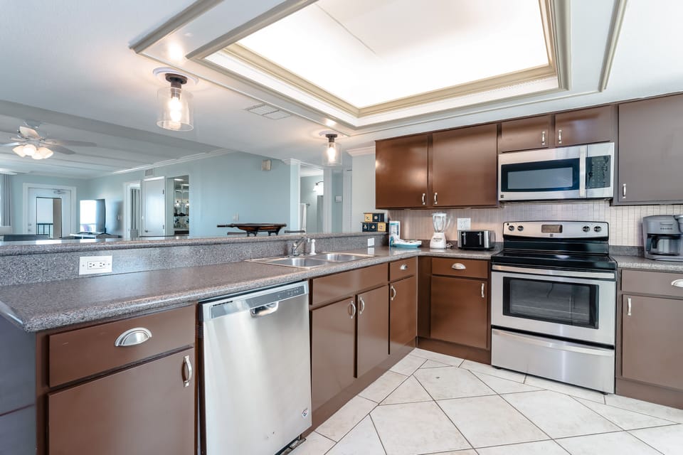 Welcome to your modernized kitchen with an electric stove, dishwasher, and microwave!