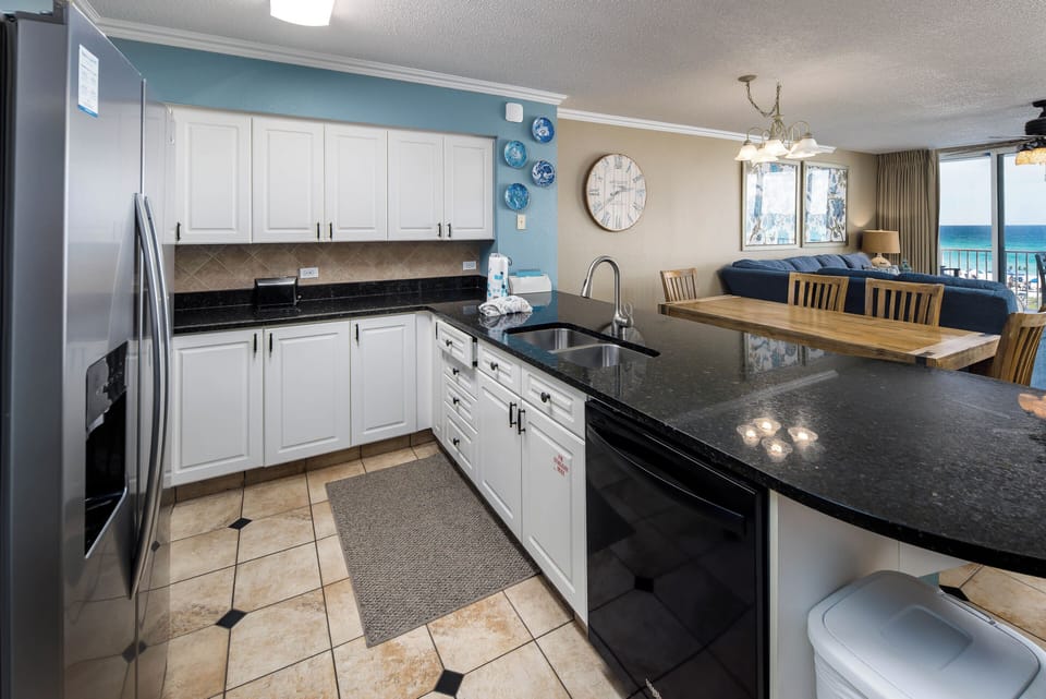 Kitchen - Side-by-side refrigerator has ice dispenser for true home comfort