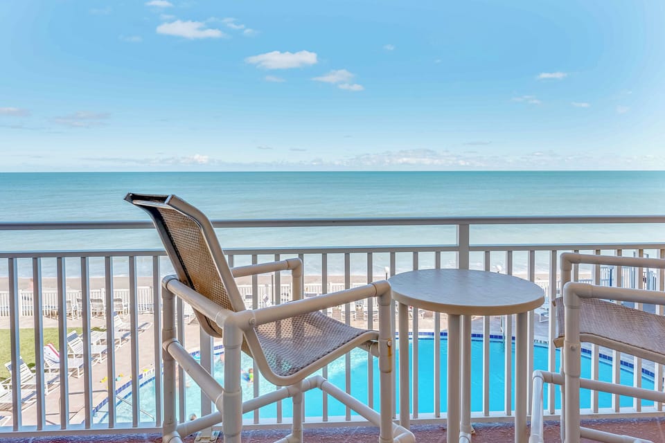 Sip your morning coffee on a private balcony while taking in the endless ocean horizon.