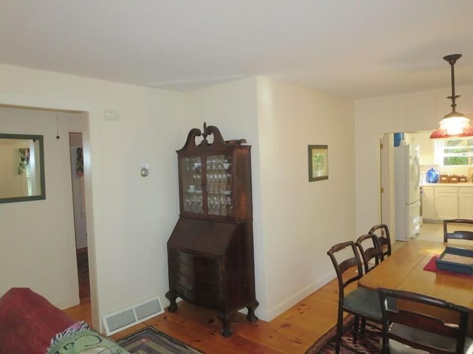 Living all on one floor. The hall off of the dining/living area offers 2 bedrooms and a full bath - 19 Old Cart Way -Chatham- Cape Cod -New England Vacation Rentals