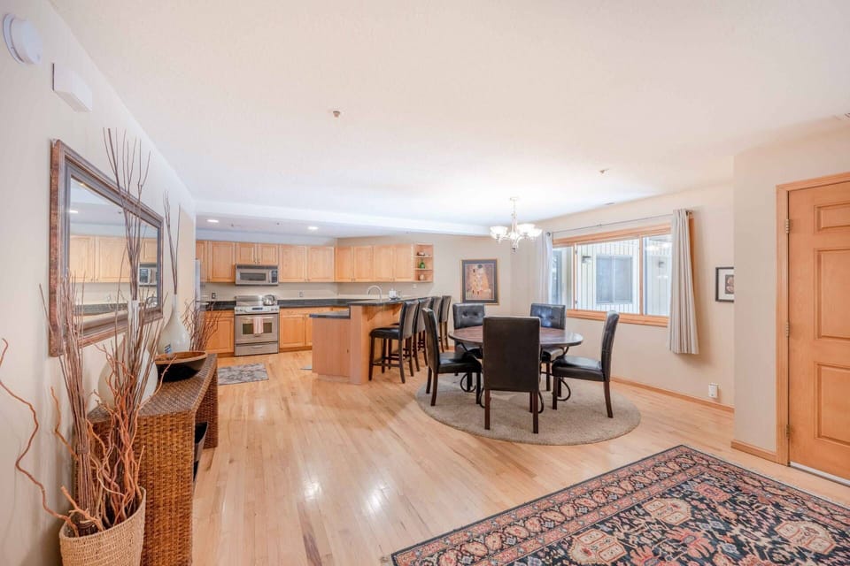 The open concept floor plan has hardwood flooring throughout, each room flowing seamlessly from one to the other.  There is ample natural light