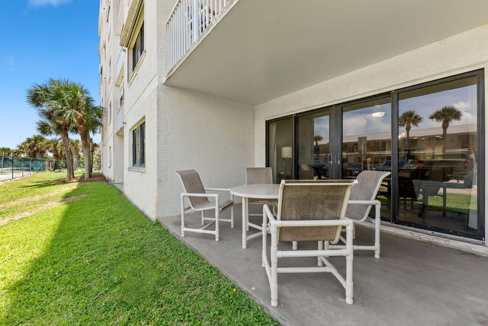 Start your day with coffee and sunshine from this ground-floor patio, complete with seating and views of the resort