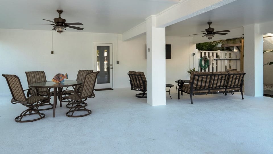 Dine or Relax in Shaded Poolside Lounge
