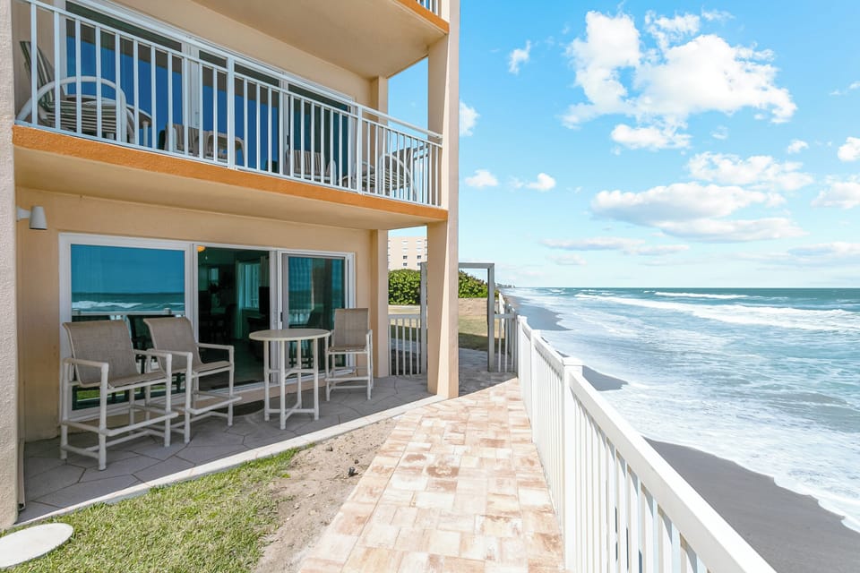 Step onto your private patio located directly on the beach