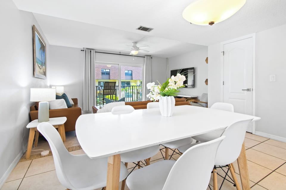 Dine in style in a beautifully designed Scandinavian dining area, featuring clean lines, warm wood tones, and a cozy, inviting ambiance.