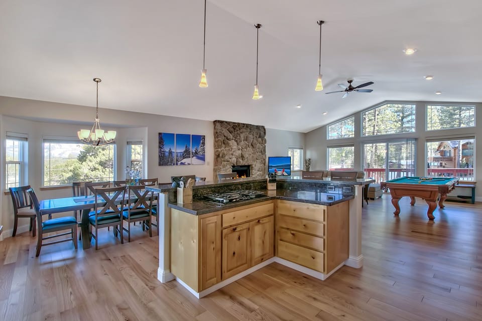 Your spacious open kitchen flows seamlessly into a warm living space, perfect for cooking memorable meals while staying connected.