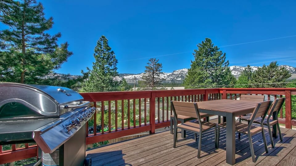 Fire up the grill while soaking in stunning mountain views from your private deck - perfect for outdoor dining with nature as your backdrop.